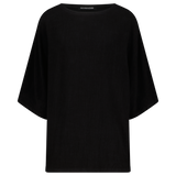 schwarzes Oversize Leinen T-Shirt von Nomadik, designed in Zurich. Luftig-leichter Stoff für Komfort und Bewegungsfreiheit an warmen Tagen.